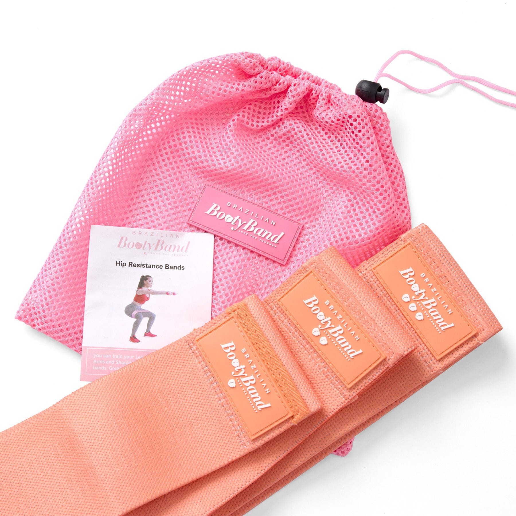 Pink drawstring bag with resistance bands