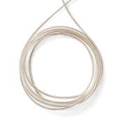 Coiled beige cable on a white background