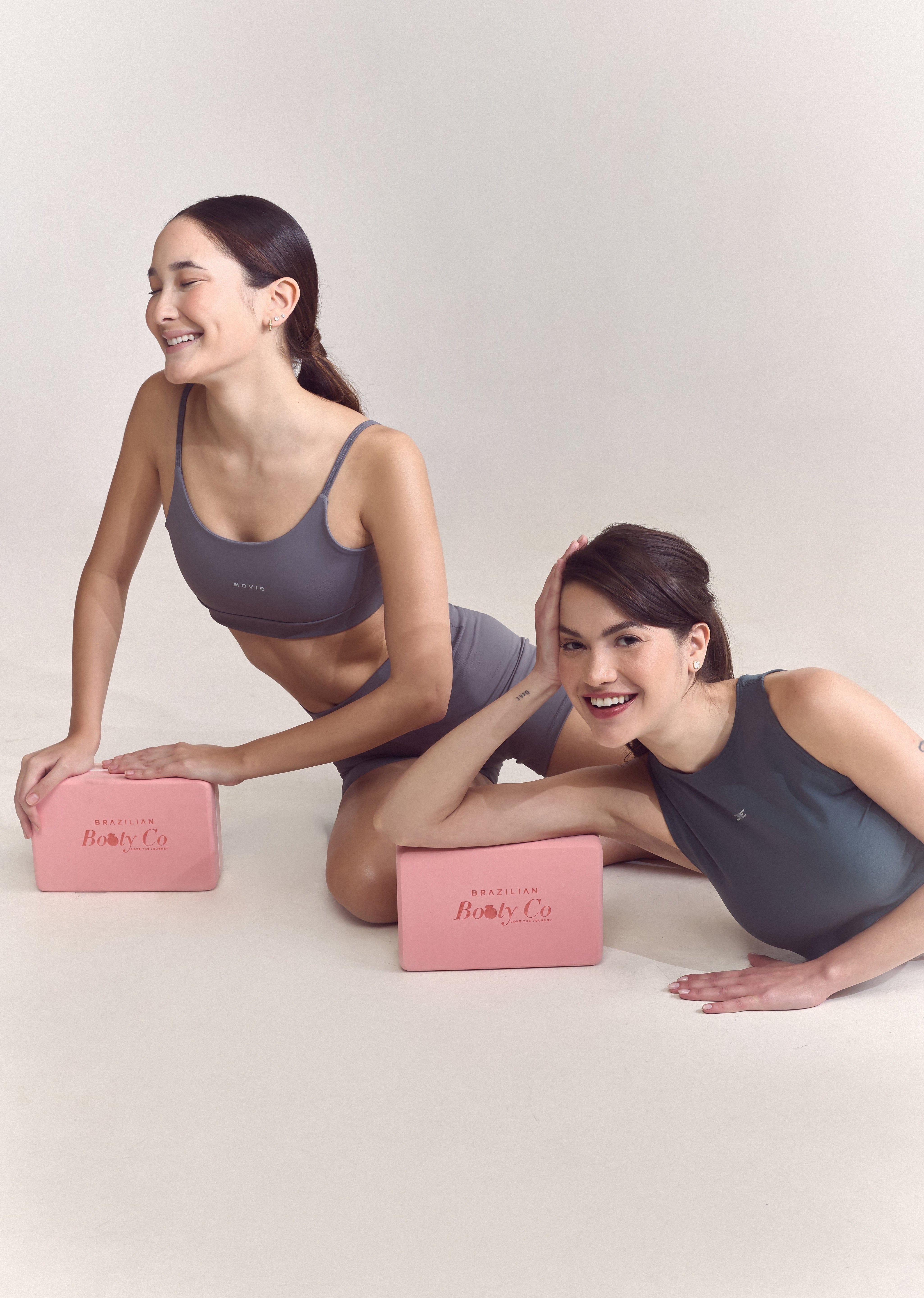 Fitness model workout with yoga block